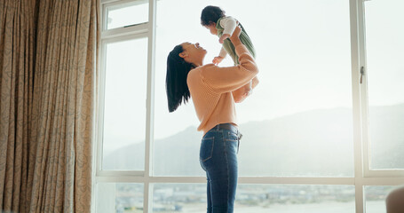 Love, happy and mother with baby in bedroom for playful, relax and free time. Happiness, smile and...