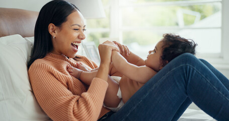 Relax, smile and mother with baby on bed for playful, love and free time. Happiness, care and...