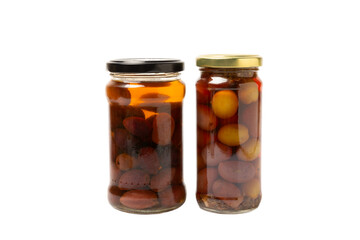 Delicious red olives in a jar isolated on white background. Pickled olives in a glass jar. Delicious olives. Close-up. Vegan.