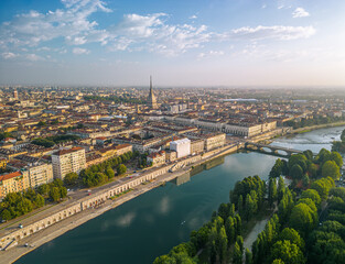 The drone aerial view of Turin city centre with Mole Antonelliana at sunrise, Piedmont region of...