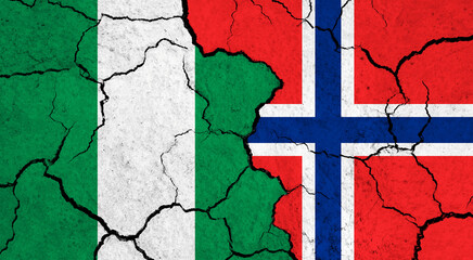 Flags of Nigeria and Norway on cracked surface - politics, relationship concept