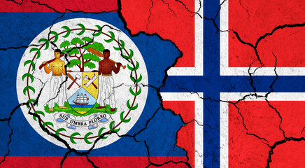 Flags of Belize and Norway on cracked surface - politics, relationship concept