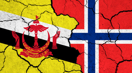 Flags of Brunei and Norway on cracked surface - politics, relationship concept