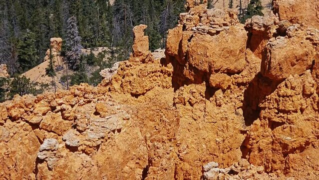 Tilt-Rugged red rock canyon rim of the Paunsaugunt Plateau in the Dixie National Forest, Utah with view to distant valley