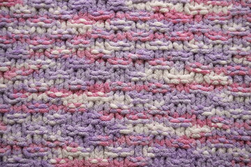 Pink and purple pastel color knitting pattern background