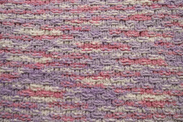 Pink and purple pastel color knitting pattern background