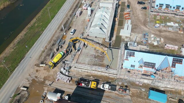 Aerial drone video of a construction site for new houses in the Netherlands