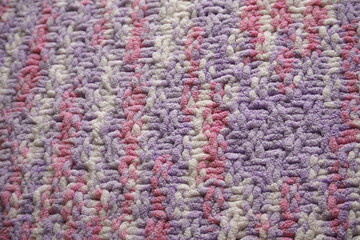 Pink and purple pastel color knitting pattern background