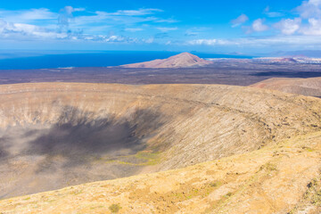 Fototapeta na wymiar The big crater of Caldera Blanca volcano, Lanzarote, Canary Islands, Spain