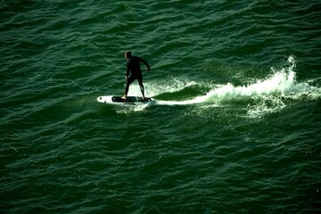 Water Boarder besides Ferry in Finland