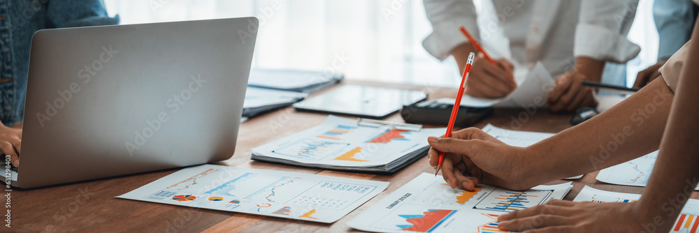 Leinwandbilder analyst team utilizing bi fintech to analyze and pointing at financial dashboard paper office. busin