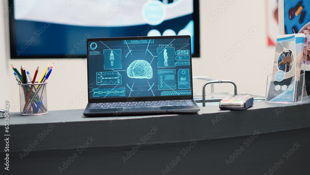 Aufkleber laptop with brain x ray scan on counter, neuroscience radiography running on screen in empty recepti