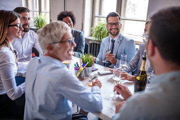 Business people celebrating success in the office