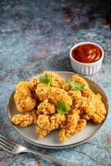 Breaded chicken strips. Chicken fingers.