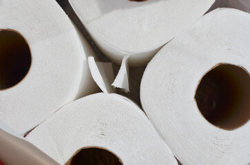 Closeup of soft, white toilet paper on a clean, bright surface, perfect for representing the importance of personal hygiene.
