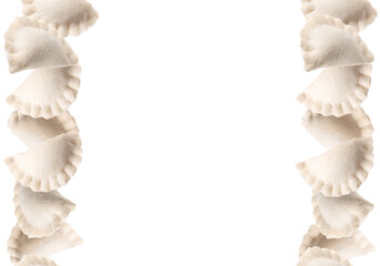 Frame of raw dumplings (varenyky) isolated on white
