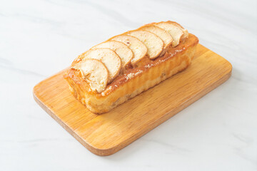 apple loaf crumbled on wood board