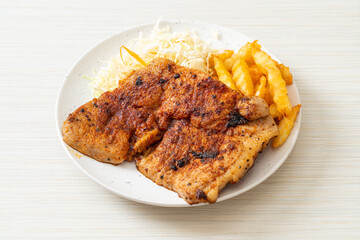 grilled spicy barbecue pork steak with french fries