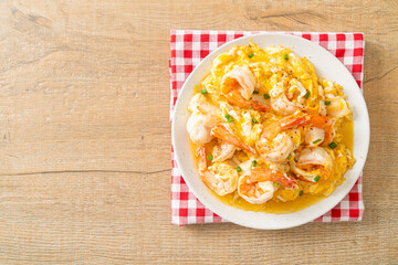 creamy omelet with shrimps or scrambled eggs and shrimps
