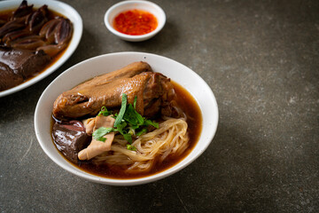 Braised duck noodles with brown soup
