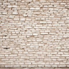 Fototapeta premium Cream and white brick wall