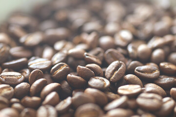 Roasted coffee bean close up. Coffee beans with natural light in the morning