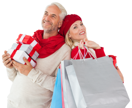 Digital png photo of caucasian couple with bags and presents on transparent background