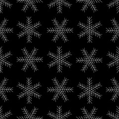 Black and White Seamless Pattern with Hand Drawn Snowflakes.