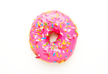 A picture of doughnut with strawberry coating and sprinklers on white background.