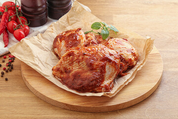 Marinated chicken leg in tomato sauce