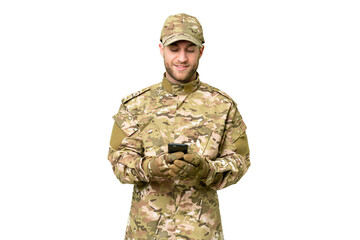 Military man over isolated chroma key background sending a message with the mobile