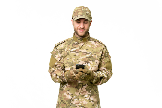 Military man over isolated chroma key background sending a message with the mobile - Powered by Adobe