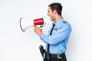Young police caucasian man isolated on white background shouting through a megaphone