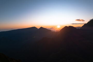 Naklejka premium Sunrise from the Maïdo belvedere and over the Cirque de Mafate in Reunion Island