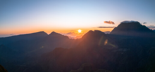 Sunrise from the Maïdo belvedere and over the Cirque de Mafate in Reunion Island - obrazy, fototapety, plakaty