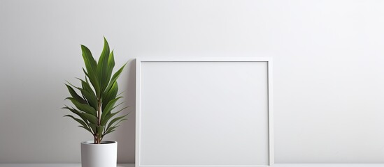A minimalist home interior is depicted in the photo, showcasing an empty white wooden photo frame
