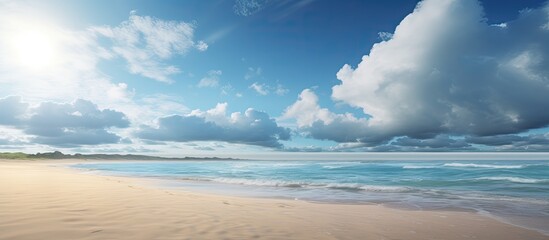 A serene scenic landscape with a wide, empty sandy beach and a beautiful cloudy sky. peaceful ambiance,