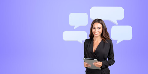 Happy businesswoman with tablet in hands, mock up text message bubble
