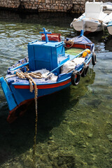 Fototapeta na wymiar Fisherman boat near coast of Gallipoli, south Italy