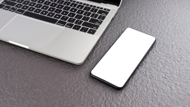 Smartphone with transparent screen and laptop computer on gray stone tabletop, png file