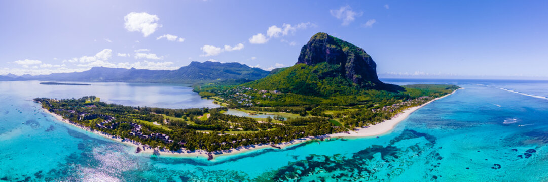 droen aerial vie at Le Morne beach Mauritius Tropical beach with palm trees and white sand blue ocean