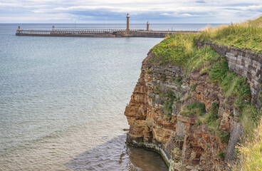 Cliff and pier.