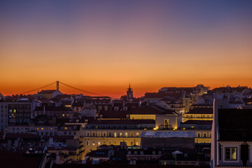 Amazing orange and purple sunset at the beautiful city of Lisbon Portugal