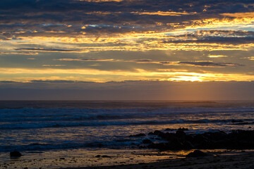Spectacular sunset at the beach of Bretignolles-sue-Mer in France
