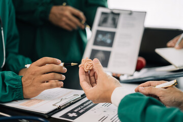 Medical team working on digital tablet healthcare doctor technology tablet using computer analyzed the results of medical reports, an online conference at the hospital.