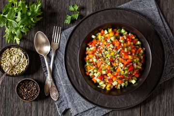 Israeli salad of finely diced veggies in bowl