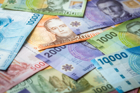 Chile money scattered on the table, Financial concept, Pesos all banknotes