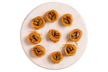 Bulbul Kadayif with Pistachio. Kadayif baklava with pistachio filling isolated on white background. Turkish cuisine desserts. Close-up. local name Antep Fıstıklı Bülbül Kadayıf