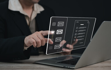 Executive or businessman working on laptop and sending or reading emails in modern office : Business communication and digital technology concept.