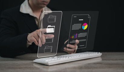 Executive or businessman working on laptop and select folder to open and read file in modern office : Business communication and digital technology concept.